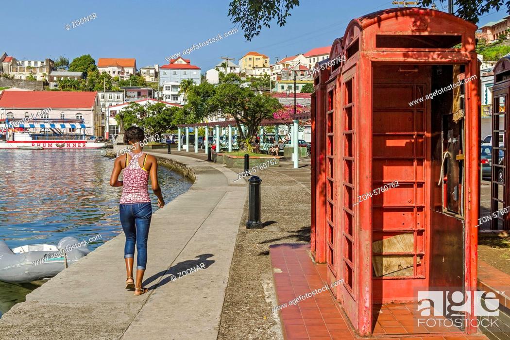 Stock Photo: Old Red Telephone Boxex St. George's Grenada West Indies.