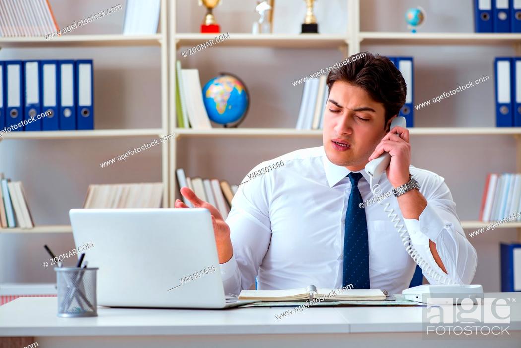 Stock Photo: Businessman operator agent working in the office.