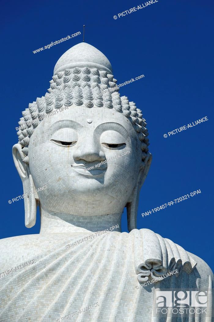 Stock Photo: 28 February 2019, Thailand, Chalong: The face of the Great Buddha of Phuket (Big Buddha, Phra Phuttha Mingmongkhon Akenakkhiri).