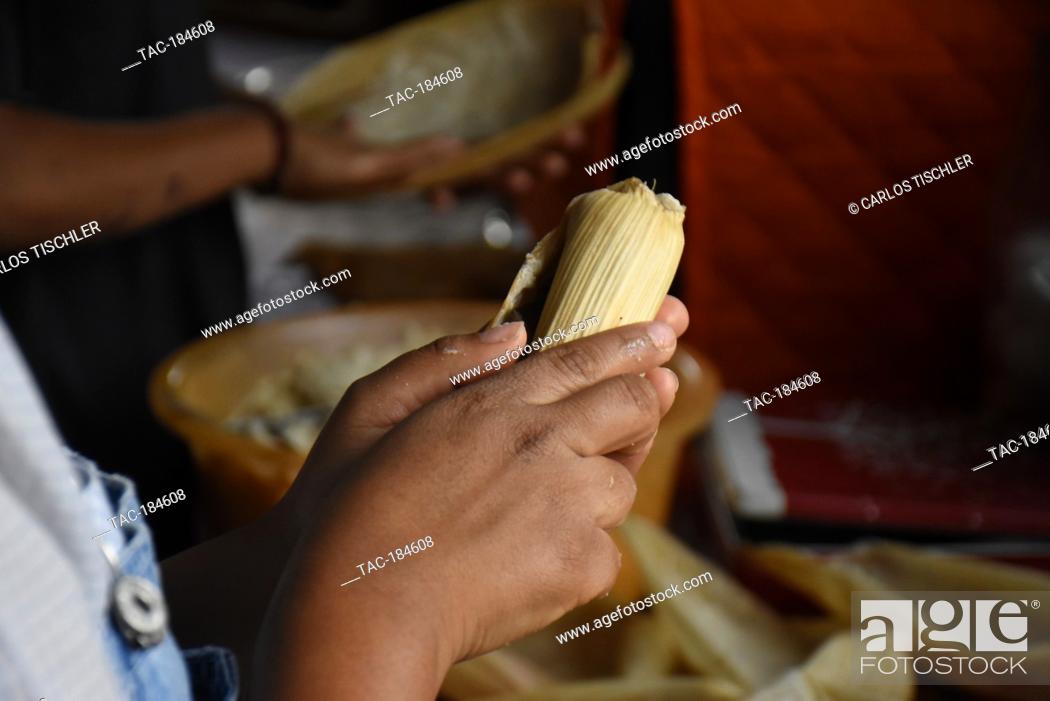 Stock Photo: TEPOZTLAN, MEXICO - JANUARY 16: Isabel's daughter prepares 'Tamales' traditional Mexican food who are cooked in this season to celebrate the candlemas day.
