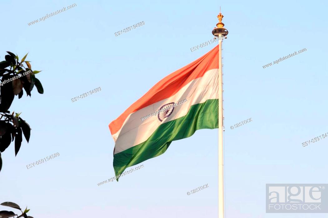 Indian flag flying against blue sky background. The National Flag of India  is a horizontal..., Stock Photo, Picture And Low Budget Royalty Free Image.  Pic. ESY-059154589 | agefotostock