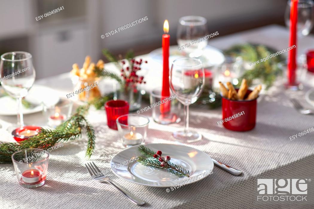 Stock Photo: christmas dinner party table serving at home.