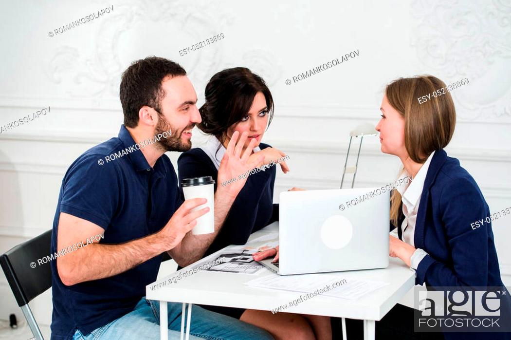 Stock Photo: Young couple meeting architect for future house.