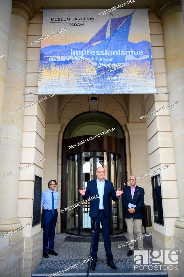 Stock Photo: 14 August 2020, Brandenburg, Potsdam: Dietmar Woidke (M, SPD), Minister President of Brandenburg, begins his press tour by speaking in front of the entrance to.