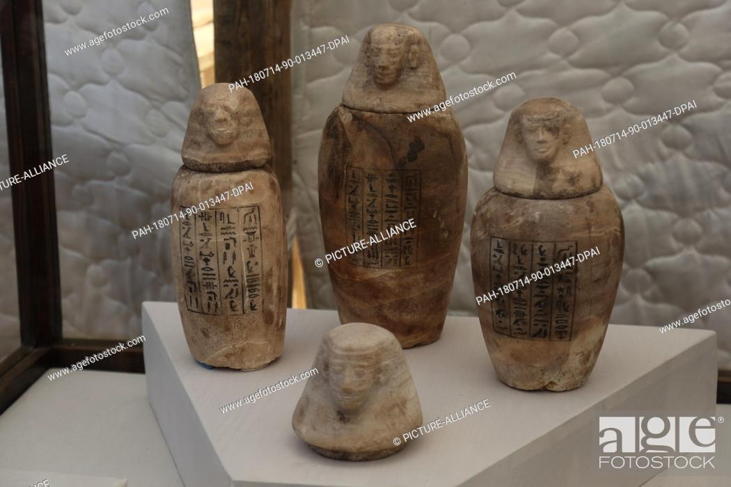 Stock Photo: A general view of burial canopic jars that were discovered by a German-Egyptian mission, at the Saqqara burial ground in Giza, Egypt, 14 July 2018.