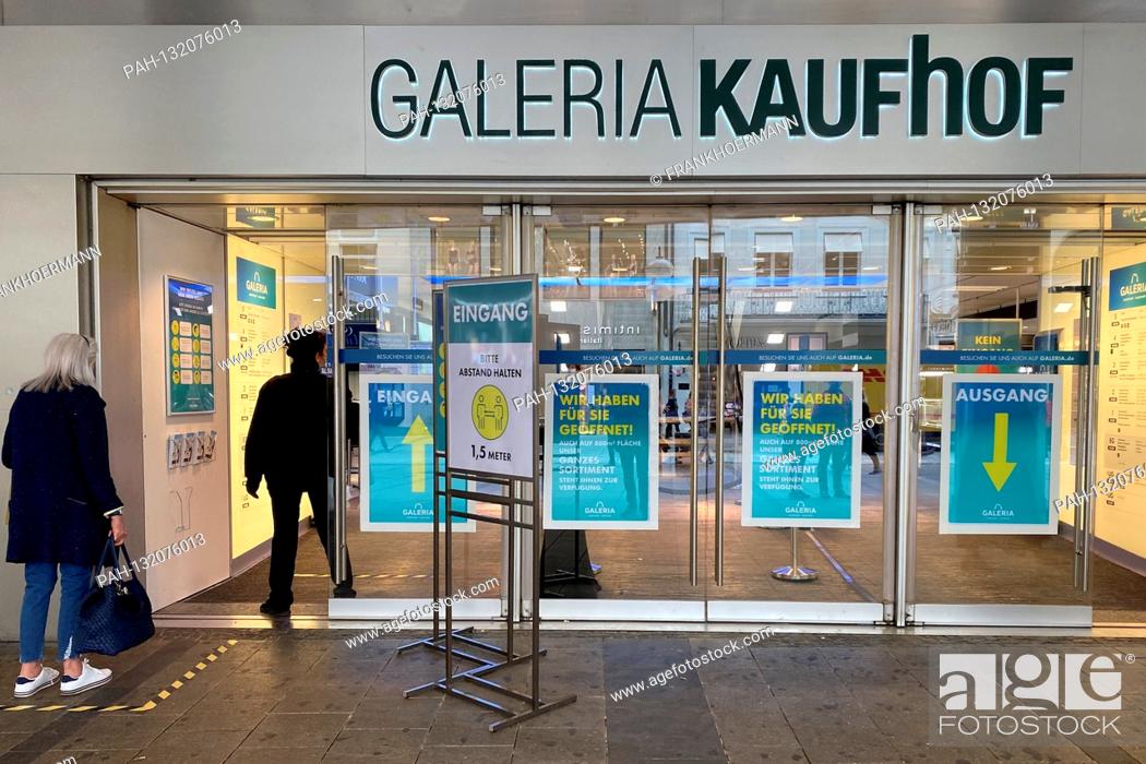 Stock Photo: Public life in times of the coronavirus pandemic on April 29, 2020 in Munich. Entrance from Galeria Kaufhof in the pedestrian zone Neuhauser Strasse.