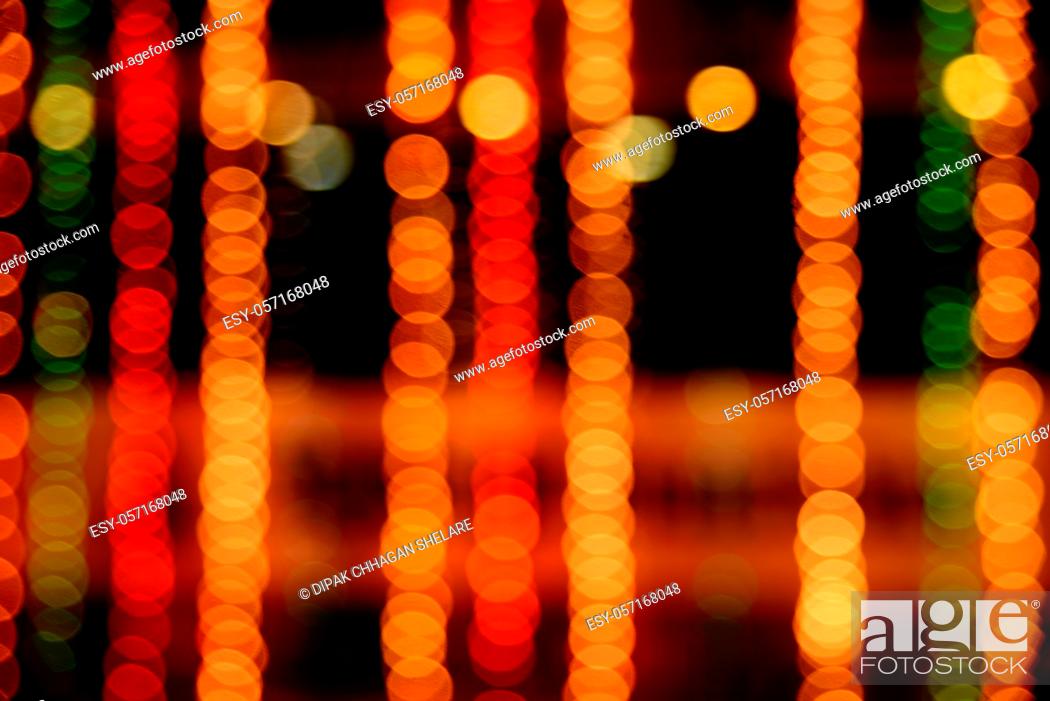 Stock Photo: Abstract Light Bokeh Background. Defocused light dots abstract background.