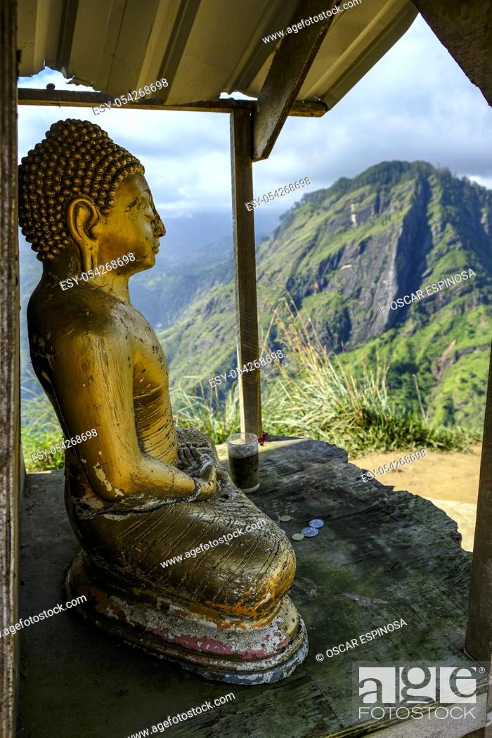 Stock Photo: Buddha statue in the Little Adamâ. . s Peak in Ella, Sri Lanka.