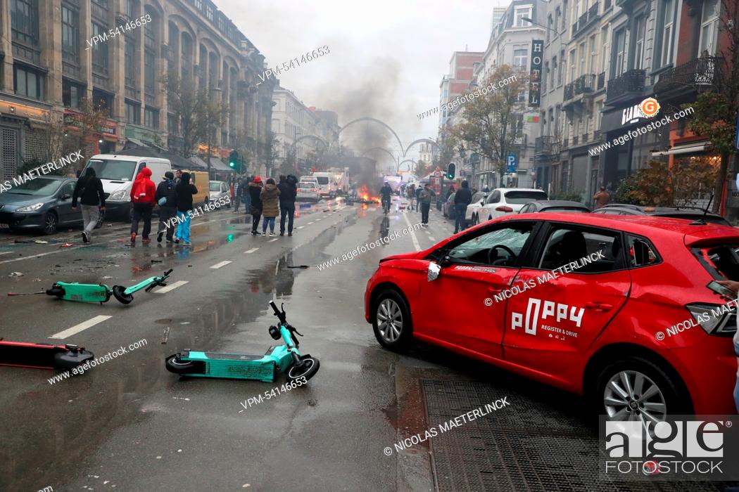 Stock Photo: Illustration picture shows rental e-steps lying in the middle of the street, in the center of Brussels, during a soccer game between Belgium's national team the.