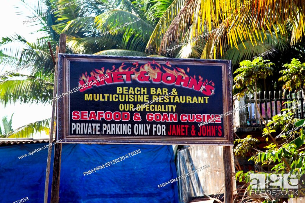 Stock Photo: Sign board of a restaurant, Janet and John's, Goenkar Vaddo, Mid Anjuna Beach, Anjuna, Bardez, North Goa, Goa, India.