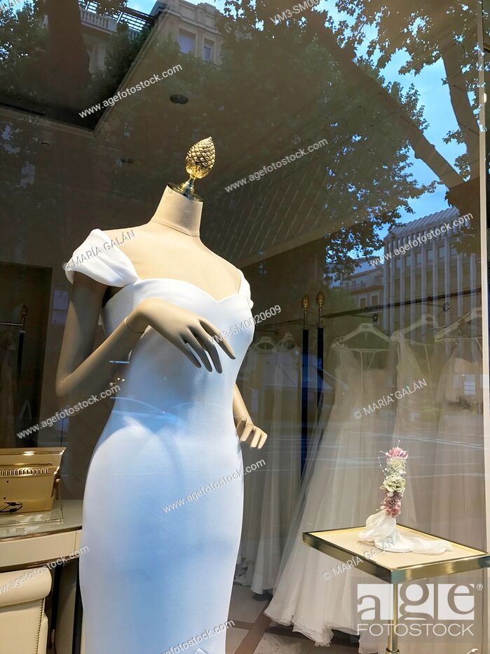 Stock Photo: Wedding dress in a shop window. Madrid, Spain.