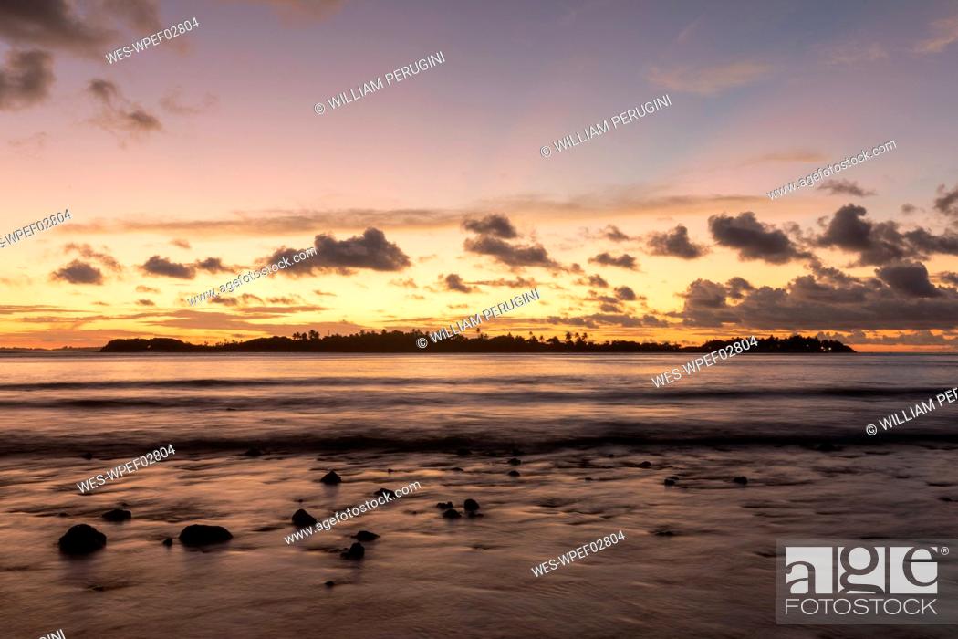 Stock Photo: Beautiful sunset with clouds and reflections on the water, Male, Maldives.