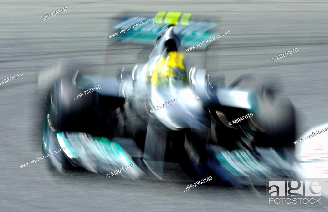 Stock Photo: Formula 1 racing car speeding around a corner during the free practice session for the Spanish Grand Prix at the Circuit de Catalunya, 11 May 2012.