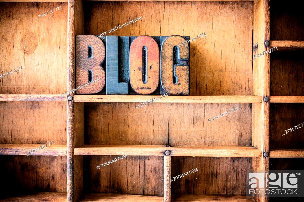 Stock Photo: The word BLOG written in vintage wooden letterpress type in a wooden type drawer.