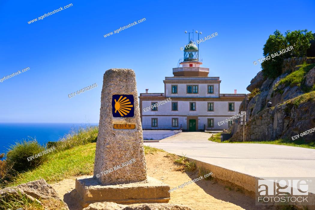 Stock Photo: End of Saint James Way sign and lighthouse of Finisterre in Galicia Spain photomount.