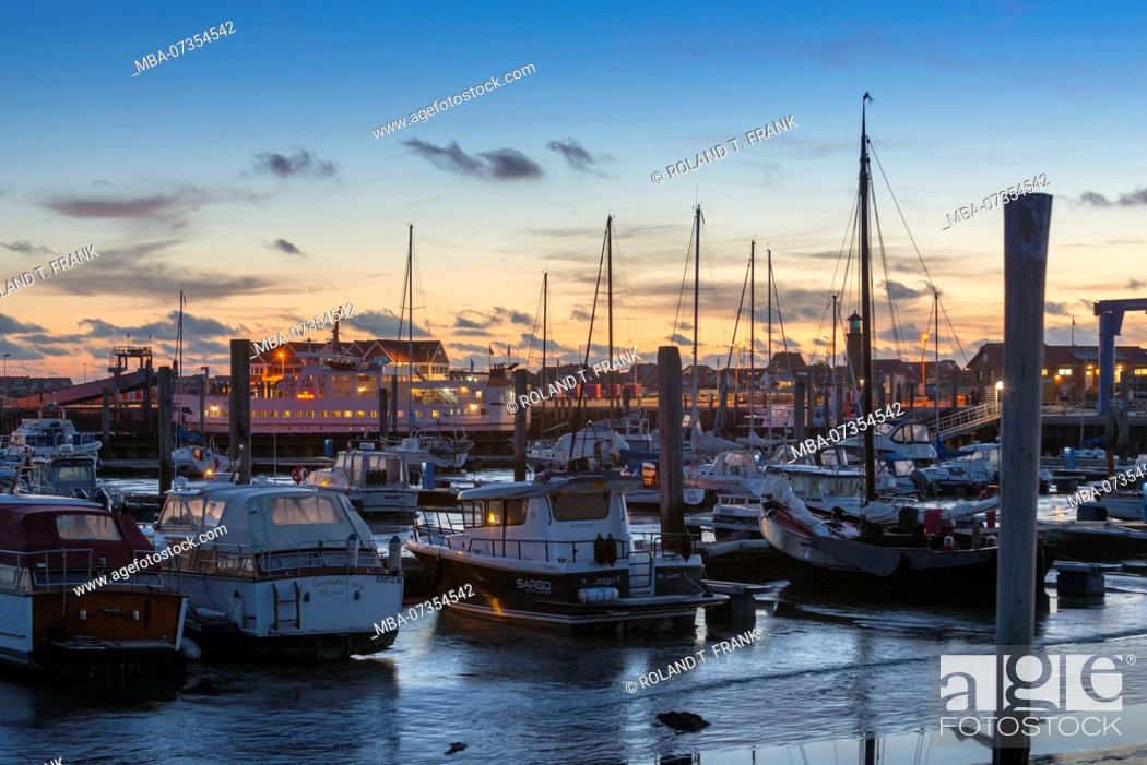 Stock Photo: Germany, Lower Saxony, East Frisia, Juist, the harbor at the Blue Hour.