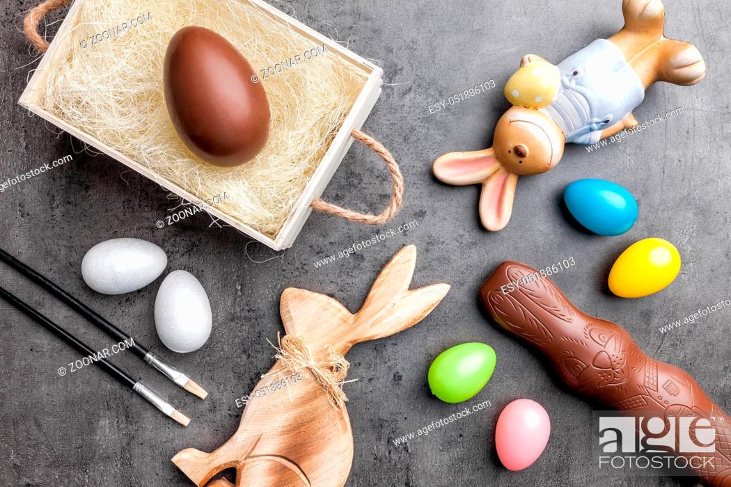 Stock Photo: Variety of traditional Easter decoration on a rustic background.
