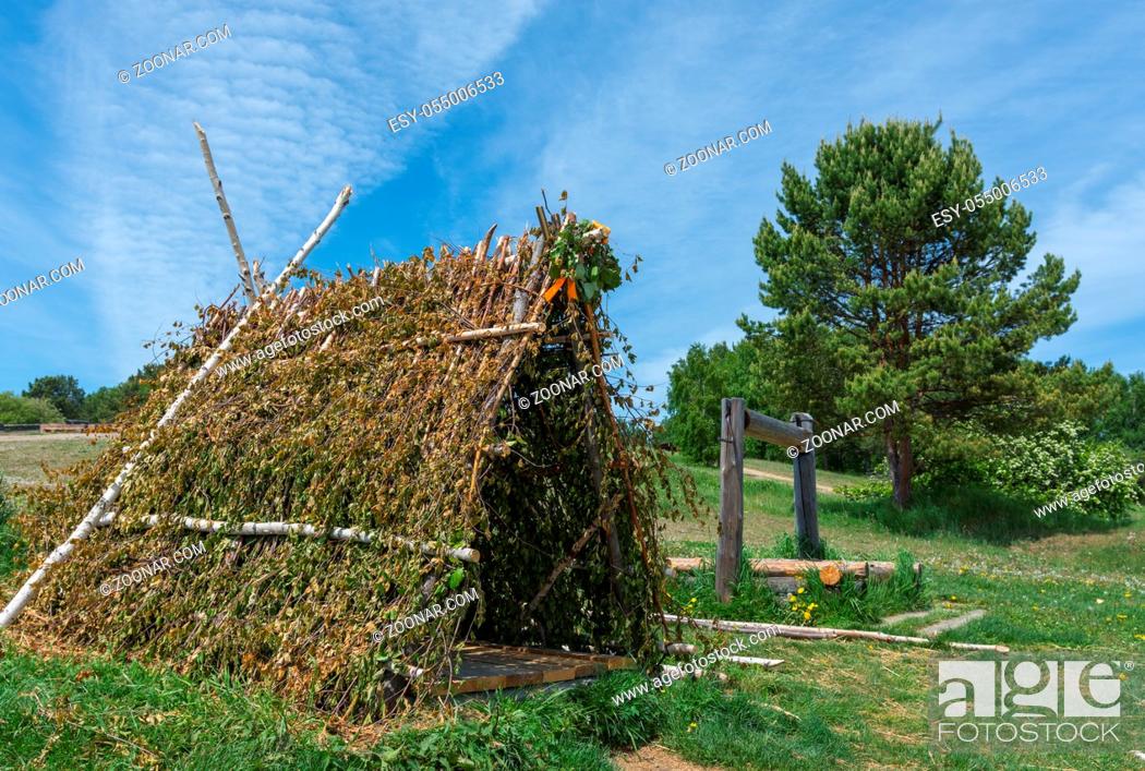 Stock Photo: Russia, Taltsy, beautiful landscape, view of a hut from birch branches.