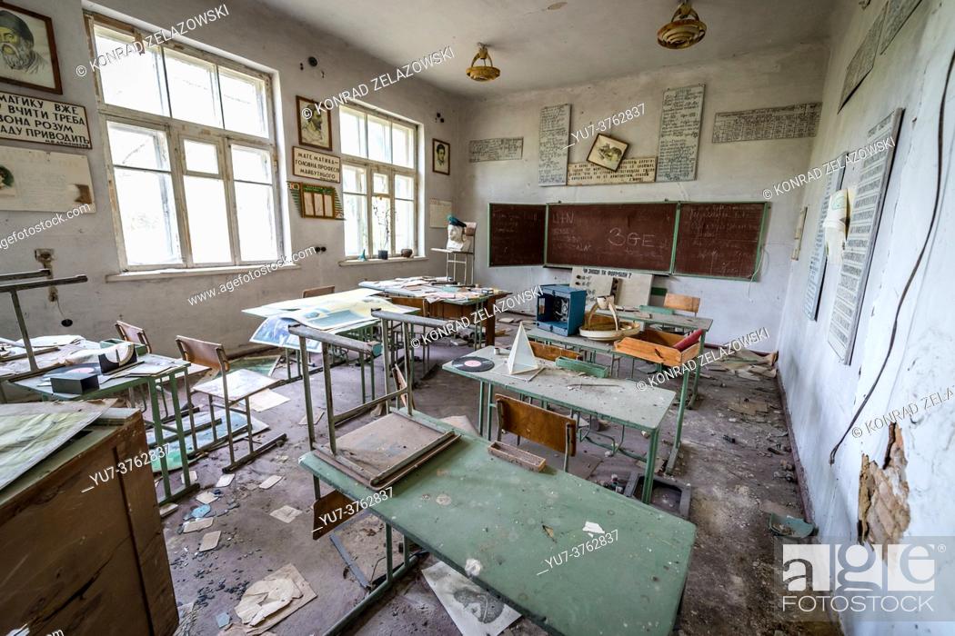 Stock Photo: Classroom with a blackboard in old secondary school in Mashevo abandoned village of Chernobyl Nuclear Power Plant Zone of Alienation in Ukraine.