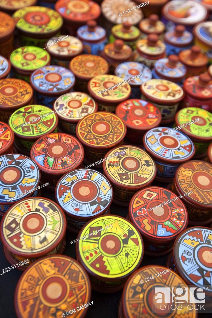 Stock Photo: Close-up shot of of colorful wooden bowls and boxes at the open-air art and craft market in Pisac, Sacred Valley, Cusco Region, Peru, South America.