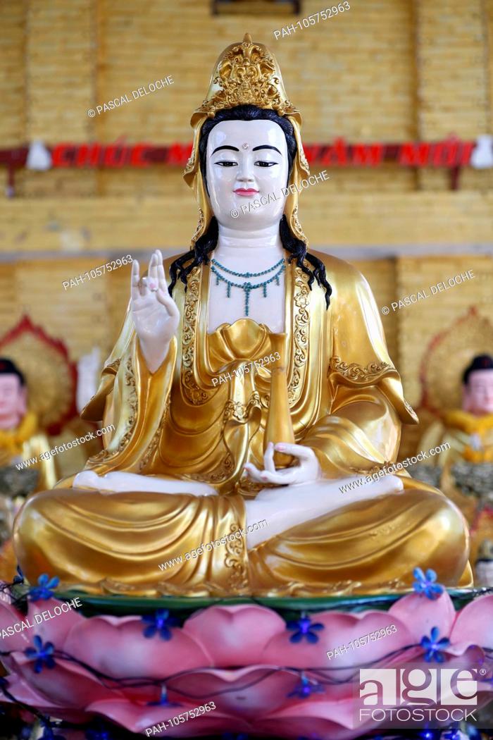 Stock Photo: Hoi Tuong Te Nguoi Hoa buddist chinese temple. Quan Am, Goddess of Mercy, Avalokitesvara Bodhisattva statue. Phu Quoc. Vietnam. | usage worldwide.
