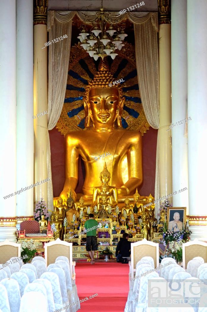 Stock Photo: Arm chair and Buddha statue, Chiang Mai, Thailand, Asia.