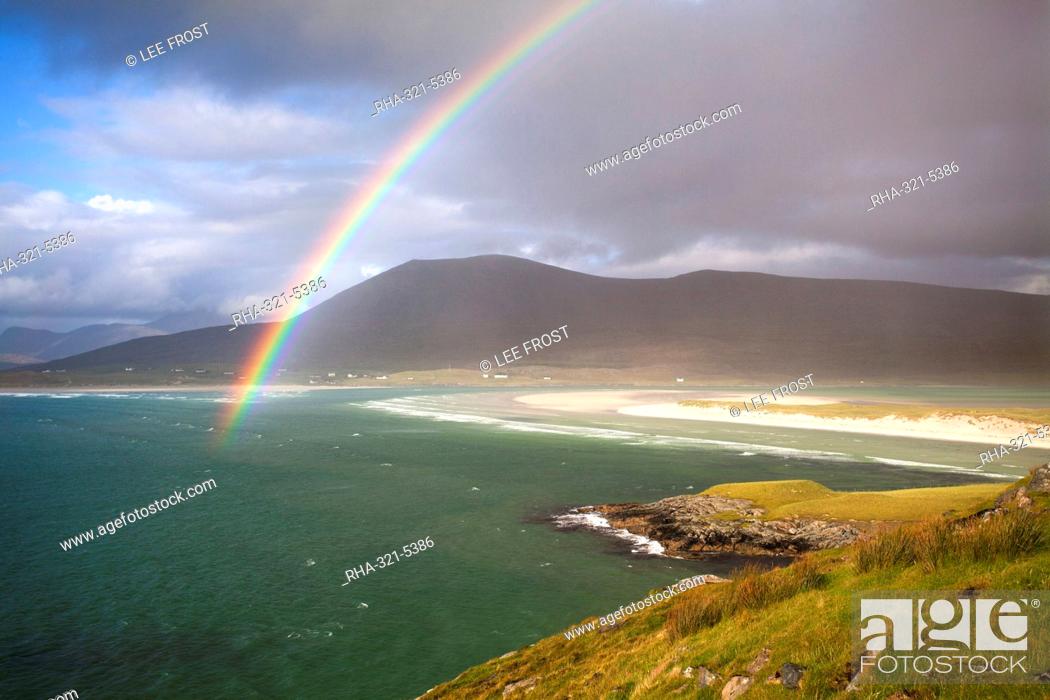 Stock Photo: View across the beach at Seilebost towards Luskentyre and the hills of North Harris with a rainbow arching across the scene, Seilebost, Isle of Harris.