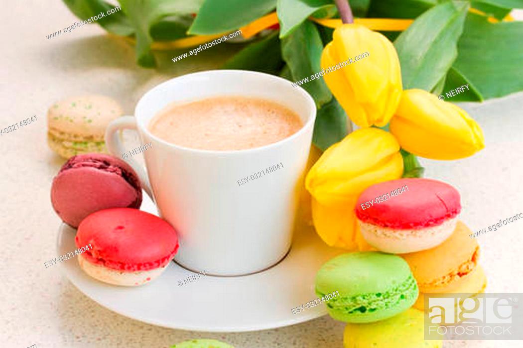 Stock Photo: breakfast with coffee, fresh tulips and macaroons.