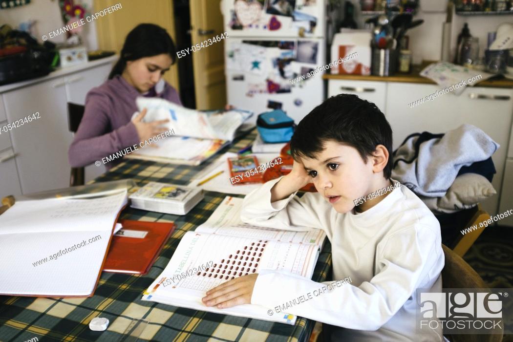 Stock Photo: Children do homework.