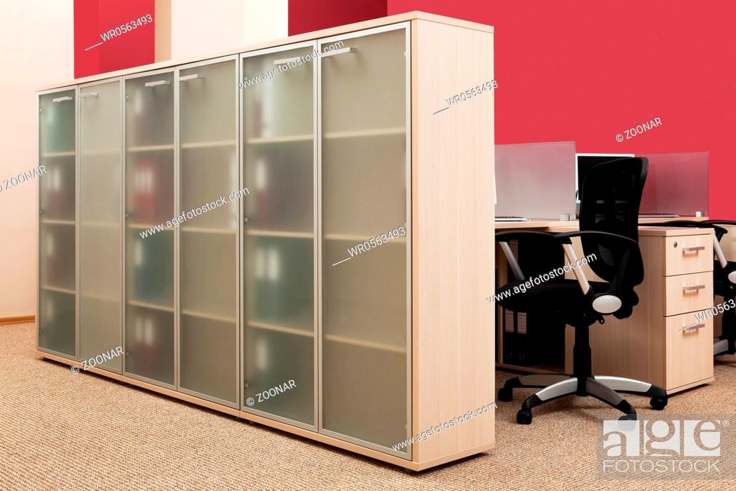 Stock Photo: bookcase with folders.