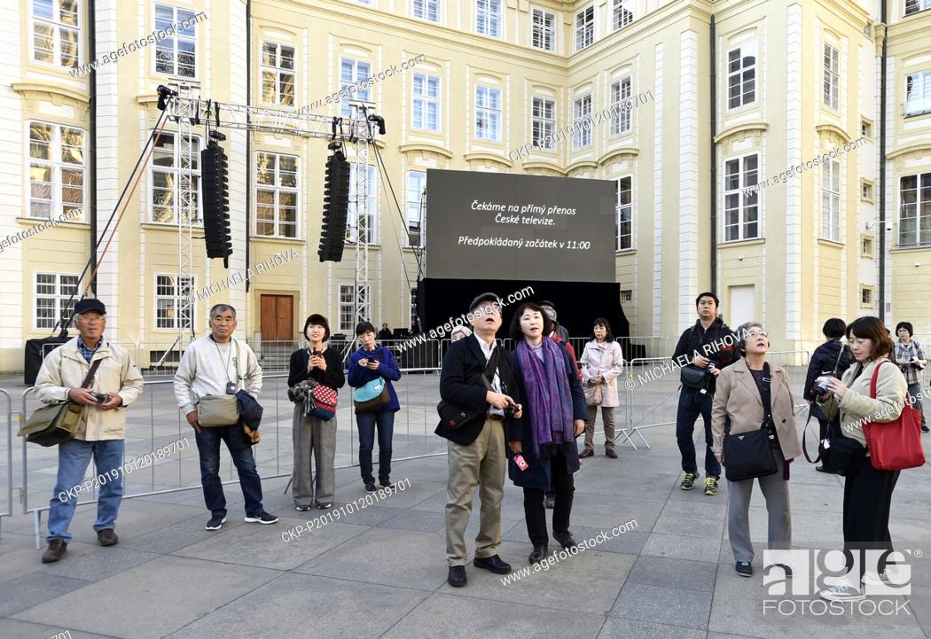 Stock Photo: The large-scale screen on the Third Courtyard of Prague Castle, Czech Republic, October 12, 2019. The public can watch a mourning ceremony to Czech pop singer.