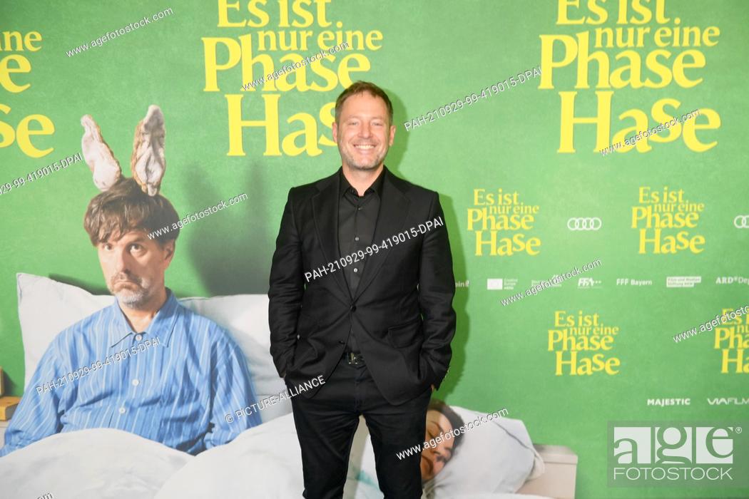 Stock Photo: 29 September 2021, Bavaria, Munich: Director Florian Gallenberger shows up at the premiere of the comedy ""Es ist nur eine Phase.