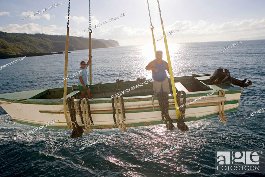 Stock Photo: The crew. Cruise on Aranui III, cargo and passenger vessel, delivering goods to Marquesas and Tuamotus islands from Tahiti and picking coprah.