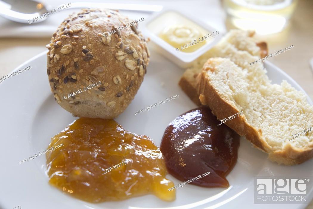 Stock Photo: Breakfast with coffee bread butter and jam.