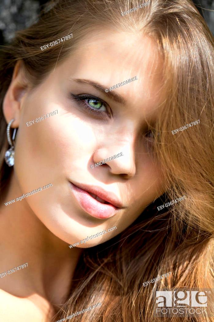 Stock Photo: Portrait close up of young beautiful woman.