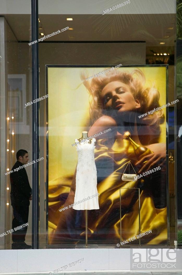 Stock Photo: USA, California, Los Angeles, Beverly Hills, rodeo Drive, boutique, display windows, dress, passer-by, no mr no property release city city metropolis, economy.