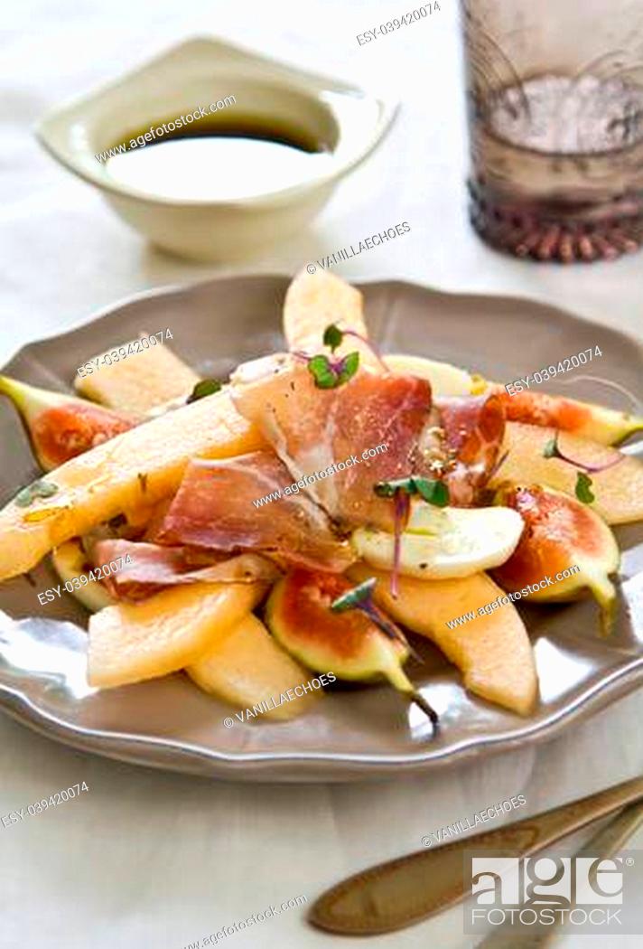Stock Photo: Fig with Cantaloupe, Prosciutto and Mozzarella salad.