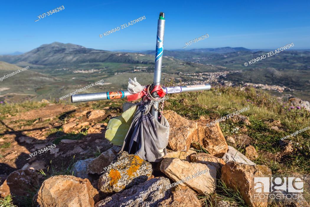 Stock Photo: Cross on the top of Cofano Mountain in Monte Cofano nature reserve in the province of Trapani on Sicily Island in Italy.