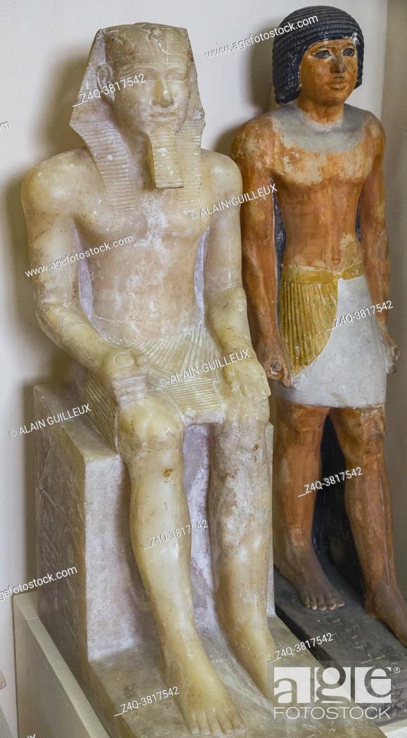Stock Photo: Cairo, Egyptian Museum, statue of king Khephren, egyptian alabaster, from Memphis. He's seated, wears a nemes with an uraeus.