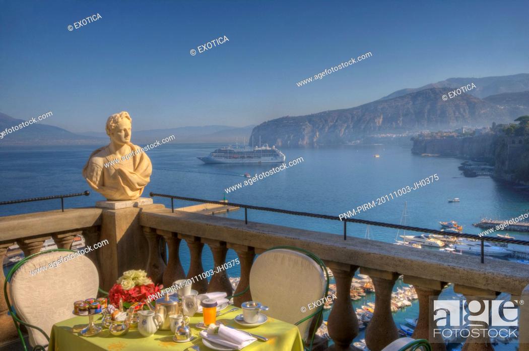 Stock Photo: Bust on the balcony of a terrace with the sea in the background, Sorrento, Campania, Italy.