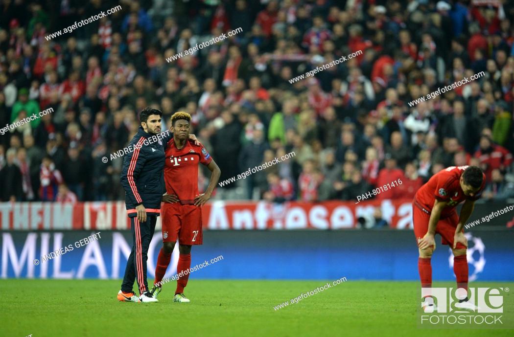 Stock Photo: Munich's Serdar Tasci (L-R), David Alaba and Robert Lewandowski react after the UEFA Champions League semi final second leg soccer match between Bayern Munich.