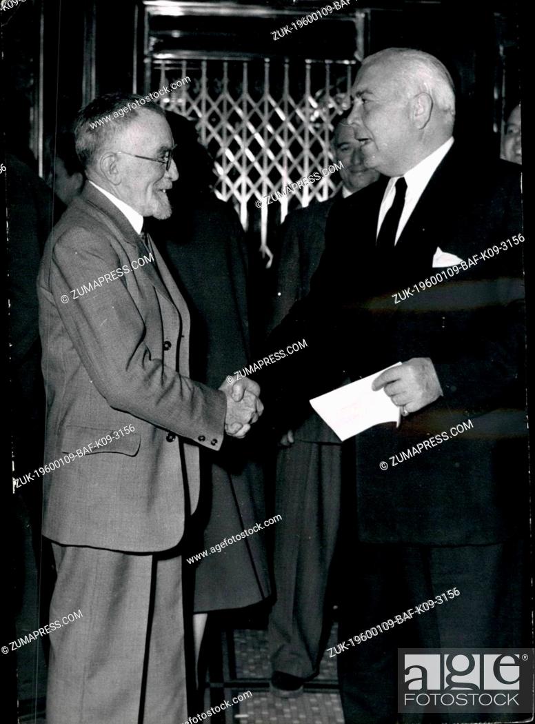 Stock Photo: 1953 - Cinemascope (three-dimension film) demonstrated in Paris Spyros P. Skouras (right), president of the 20th Century Fox Film shakes hands with Henry.