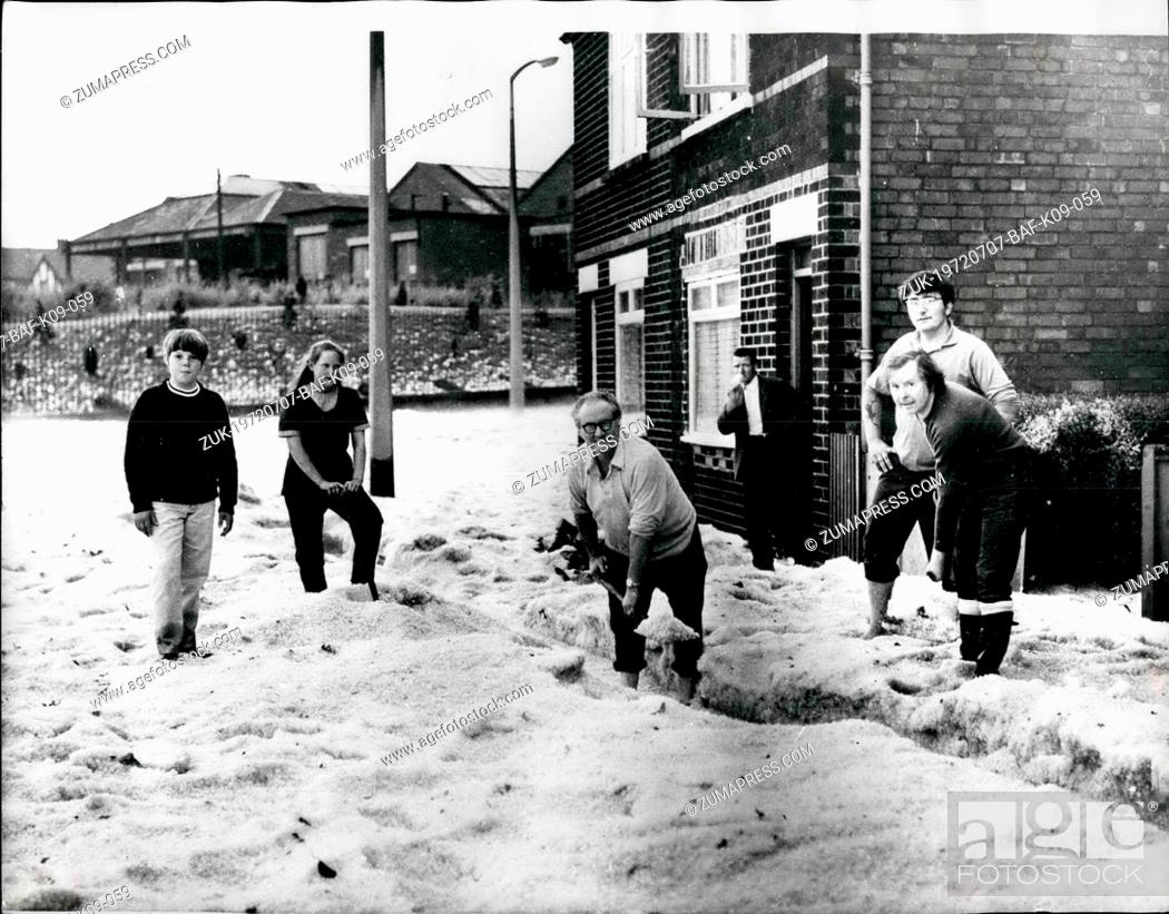 Stock Photo: Jul. 07, 1972 - Hail the feet deep. Hailstones, the size of marbles, poured down in Nottingham, causing severe flooding. Boats had to be used to rescue people.