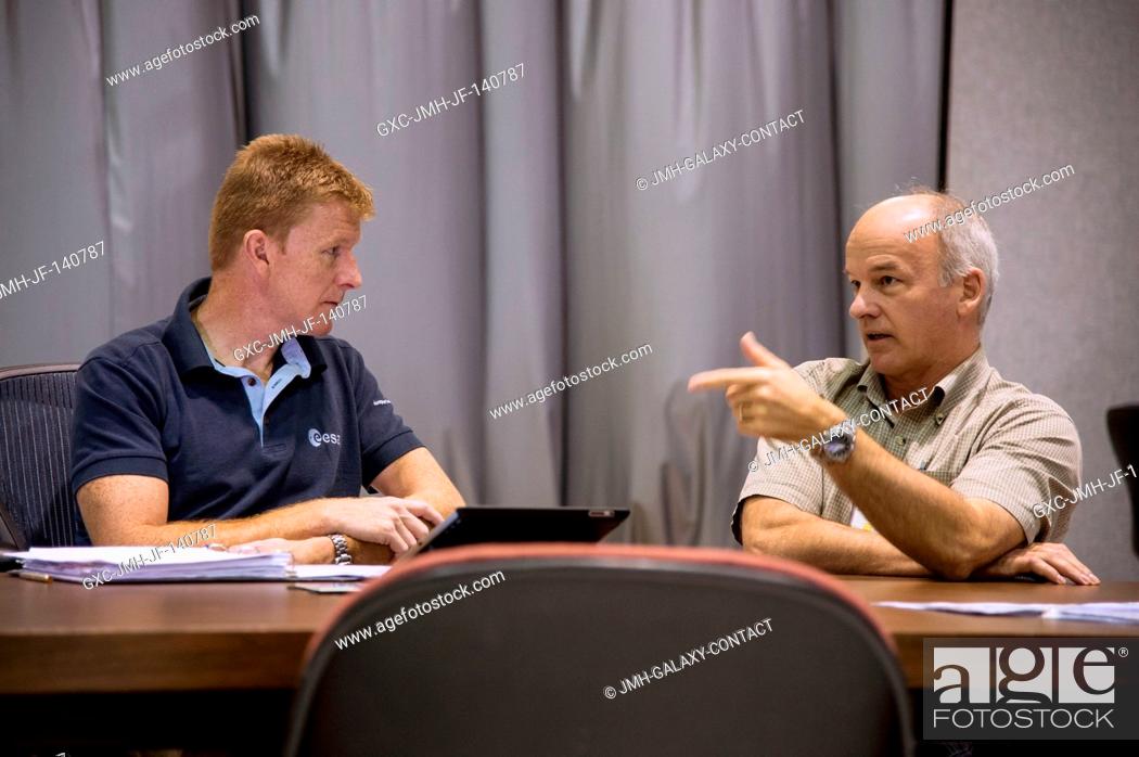 Stock Photo: European Space Agency astronaut Timothy Peake (left), Expedition 4647 flight engineer; and NASA astronaut Jeff Williams, Expedition 47 flight engineer and.