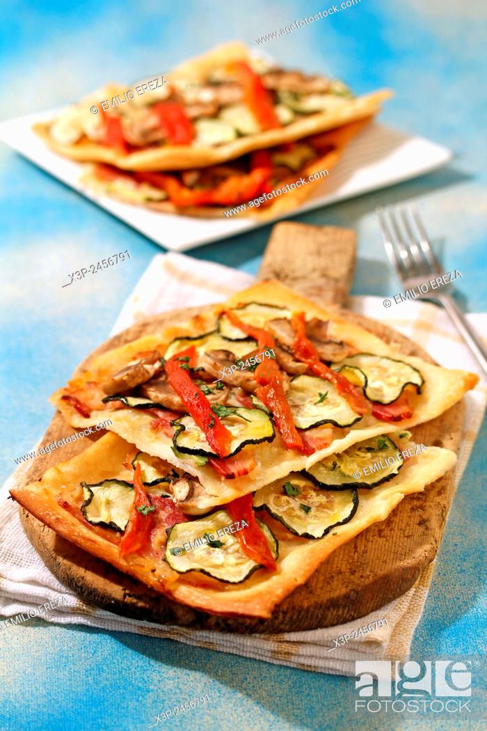 Stock Photo: Savoury pastry with bacon and vegetables.