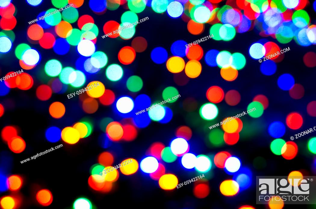 Stock Photo: illuminated bokeh background with copy space in the night.