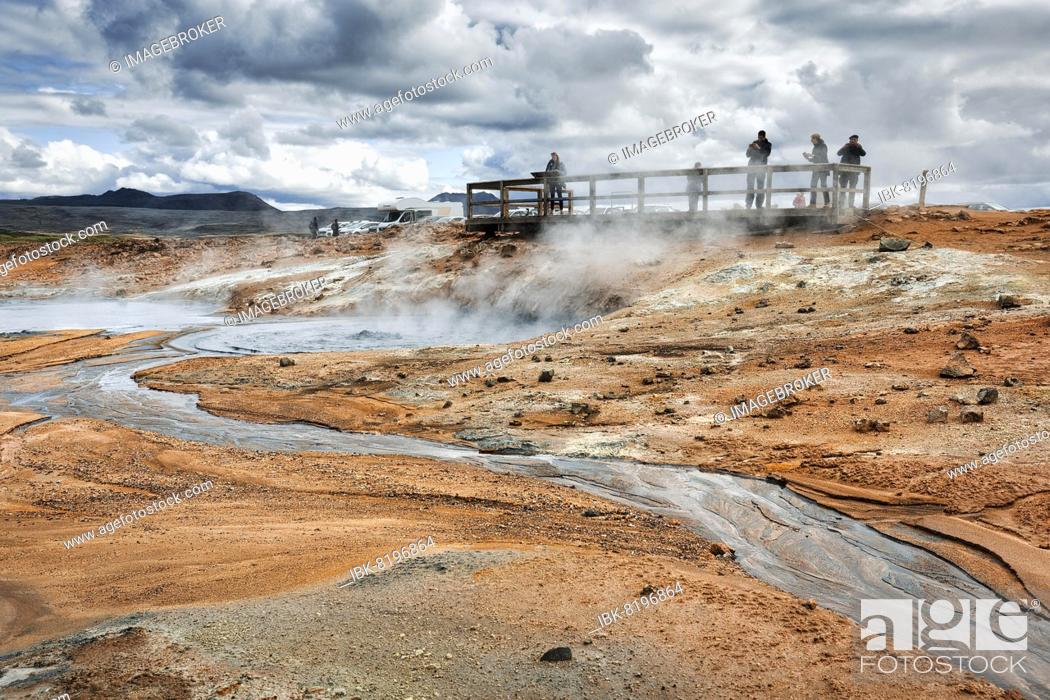 Stock Photo: Tourists on viewing platform at steaming mud pot, Hverarönd geothermal area, also Hverir, Namaskard or Námafjall, Mývatn, Krafla volcano system.