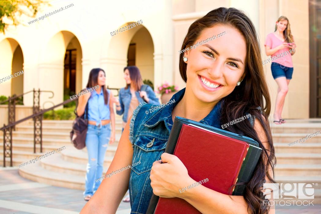 Photo de stock: Mixed Race Young Girl Student with School Books On Campus.
