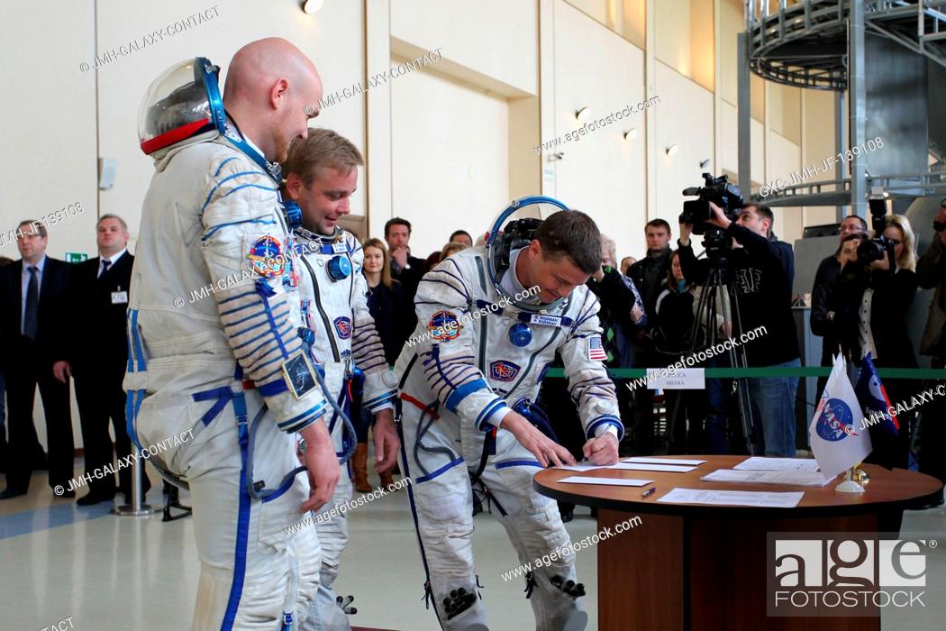 Stock Photo: At the Gagarin Cosmonaut Training Center in Star City, Russia, Expedition 4041 Flight Engineer Reid Wiseman of NASA signs in for final qualification exams May 7.