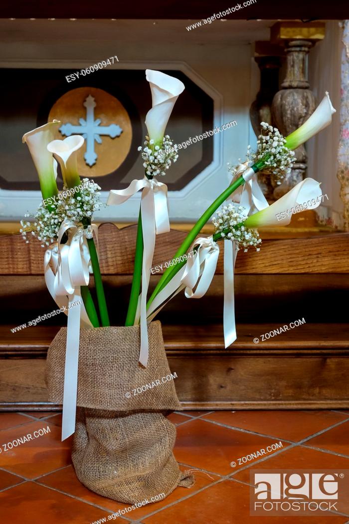 Stock Photo: Peace Lilies on Display in a Church in Pienza.